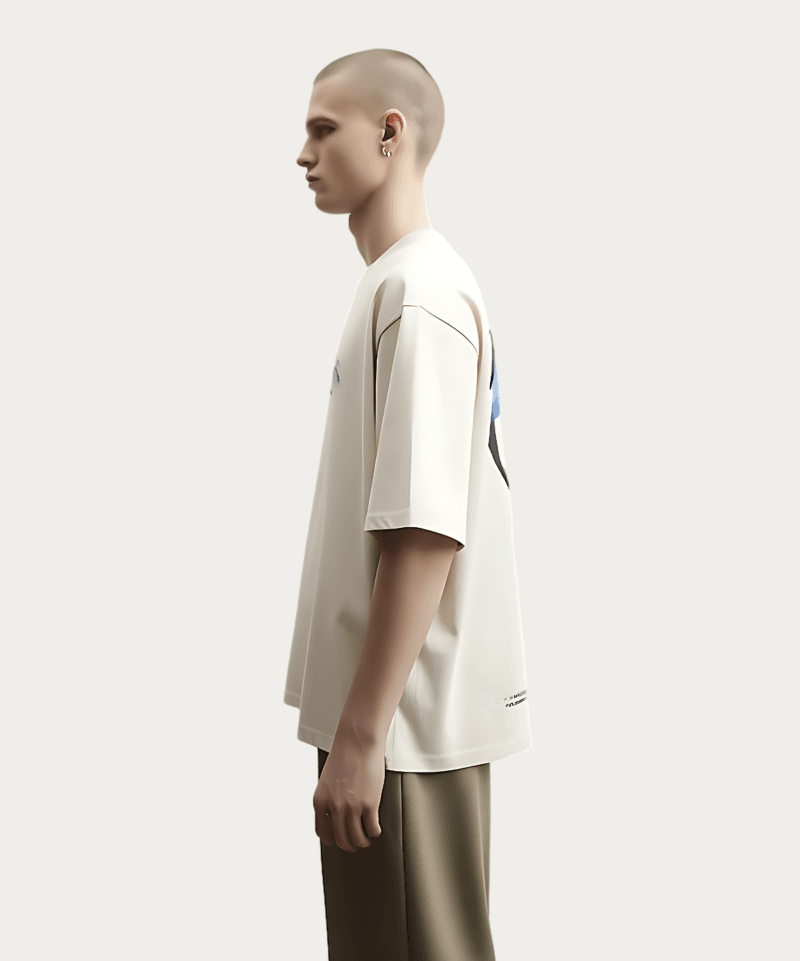 A person with a shaved head stands against a plain background, wearing a Solo Leveling Kaisel Dragon T-Shirt - Beige and a stylized wing and spine design on the back, paired with khaki pants.