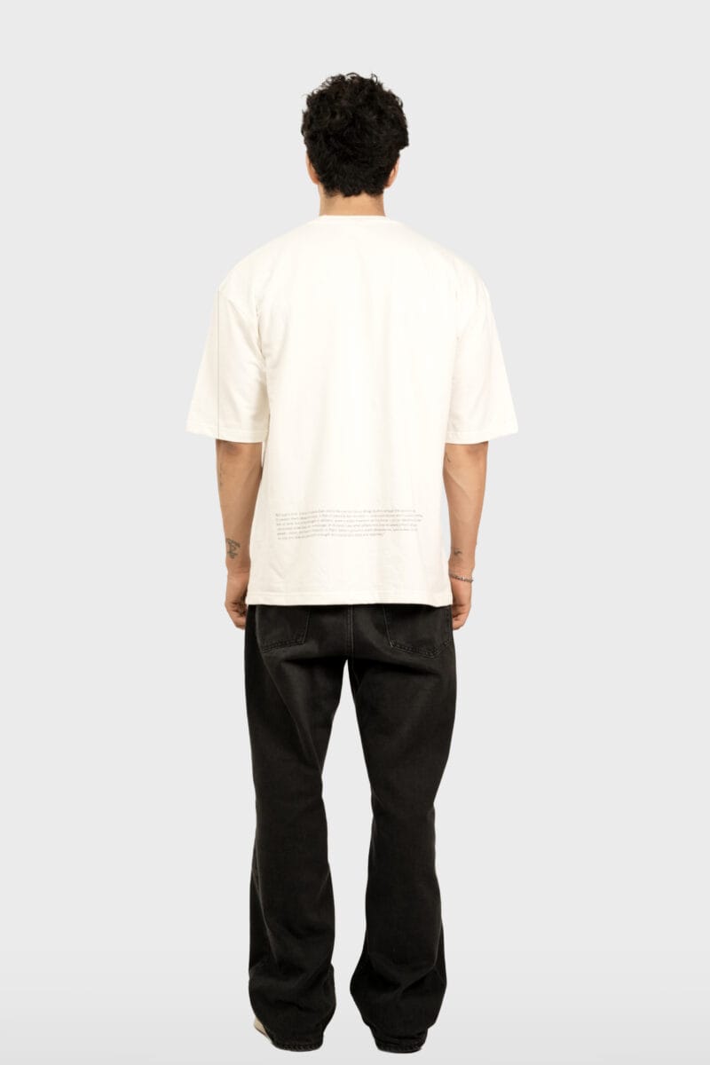 Back view of the oversized Defend Eagle Tee showing the subtle text detail.