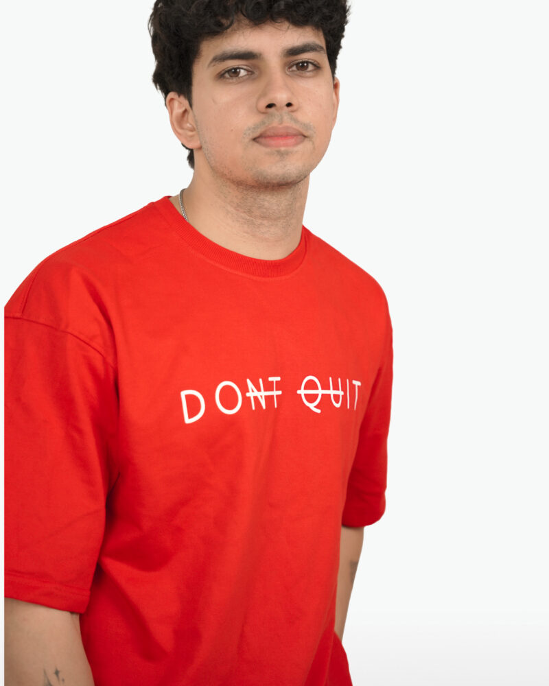 Closeup detail of the high-quality 'Don't Quit' print on the French Terry fabric.