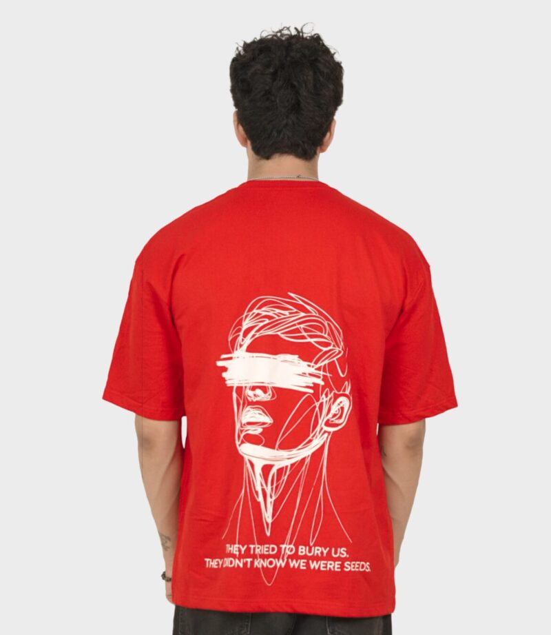 Back view of the red Don't Quit oversized tee, showing the resilience graphic print.