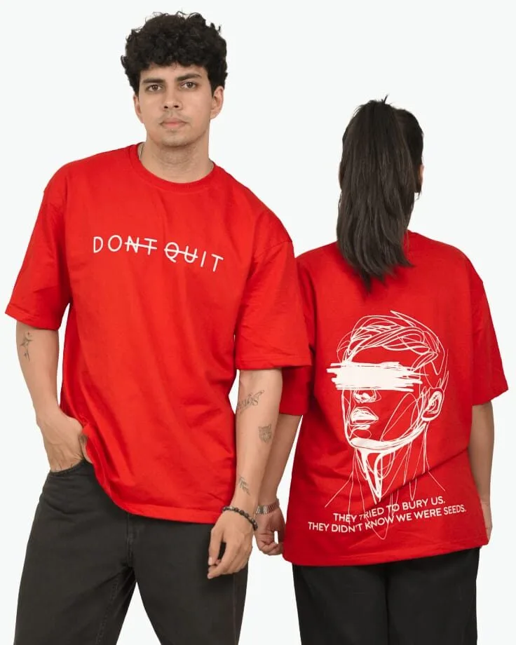 Two models showcasing the unisex fit of the Don't Quit tee