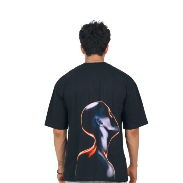Back view of the Futuristic Graphic T-Shirt, showing the metallic android artwork from yeefoo. Model in a Yeefoo oversized t-shirt. The official storefront for the premium Indian streetwear collection.