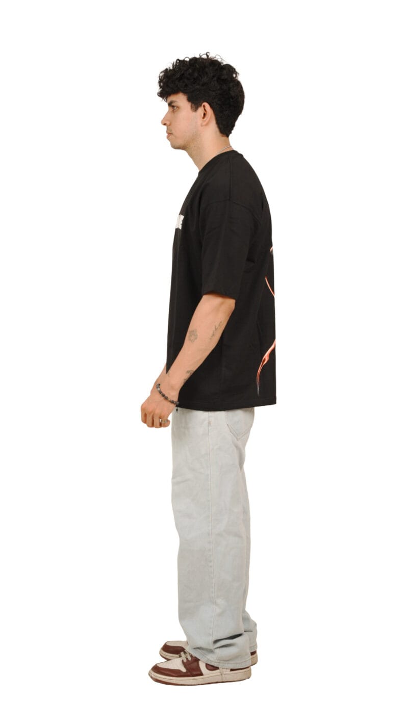 Side profile of the Futuristic Graphic T-Shirt, showing the oversized fit