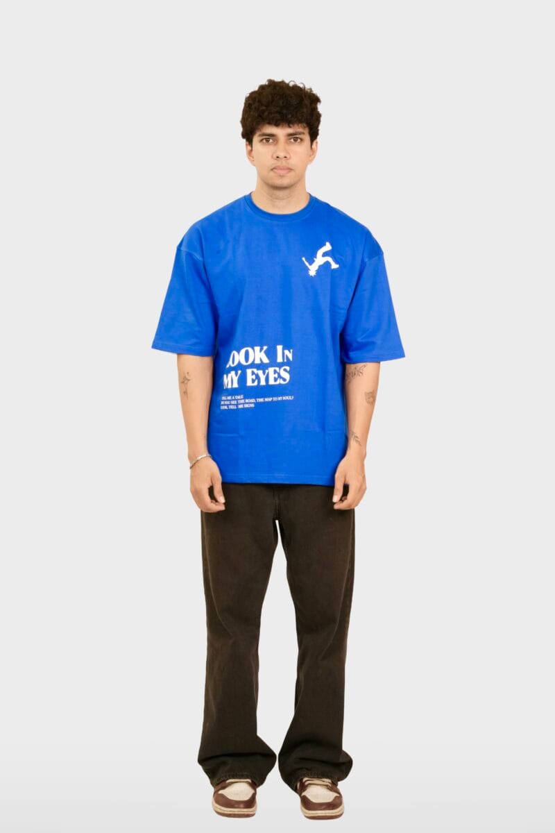 Model wearing the Yeefoo Look In My Eyes Tee, a royal blue Typographic T-Shirt.