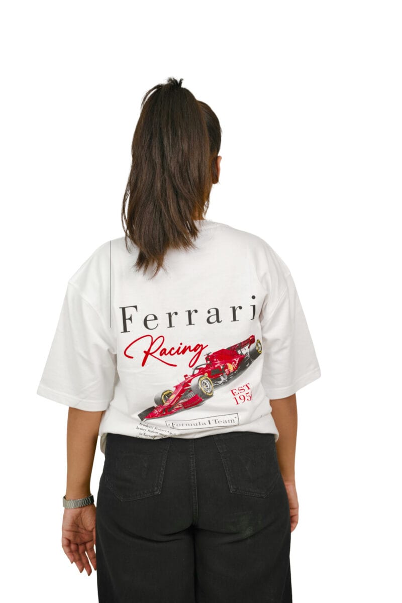 Angled view of the model wearing the black Futuristic Graphic T-Shirt.