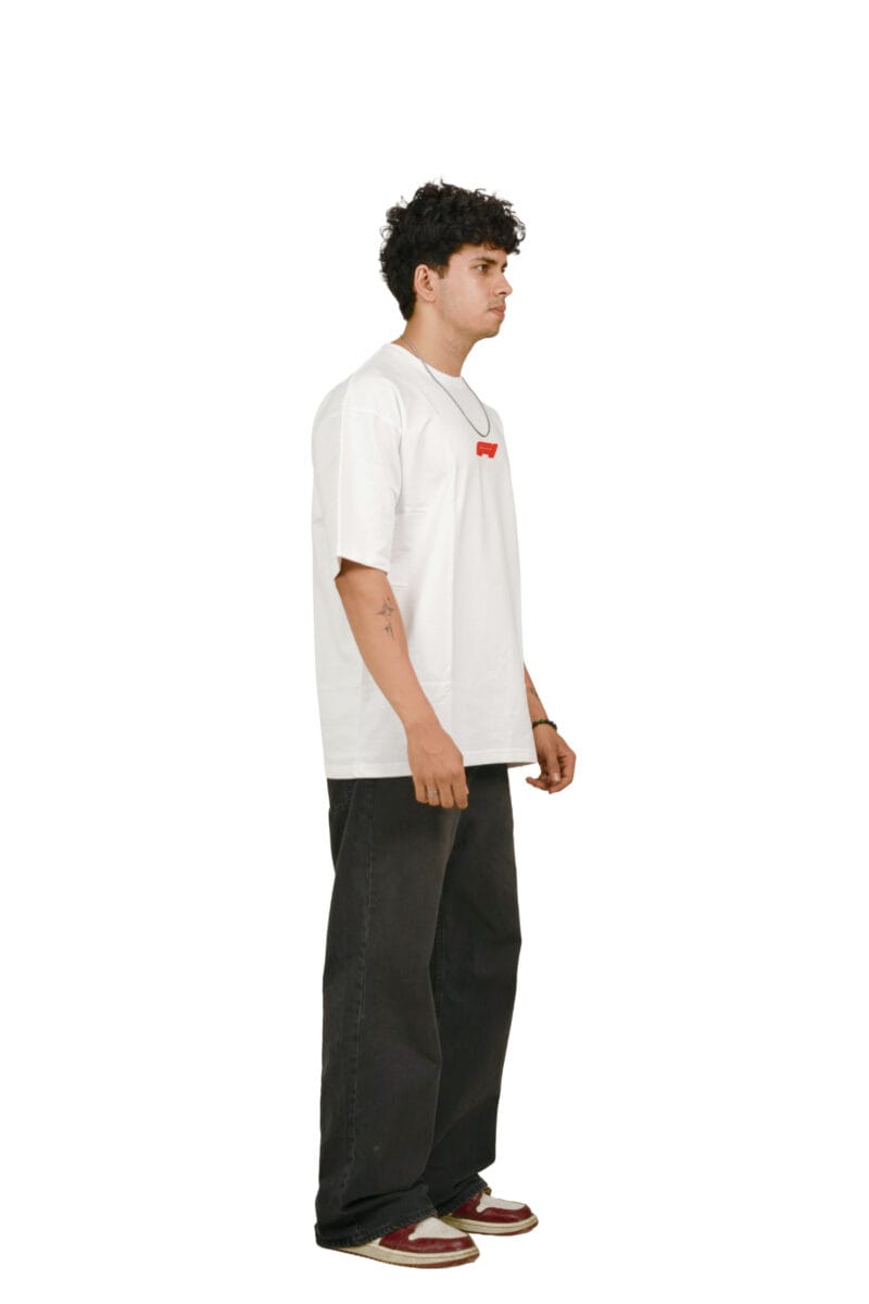 Model wearing the Yeefoo Legacy Racing Tee, a white Vintage Racing T-Shirt with an F1 inspired logo, side view.