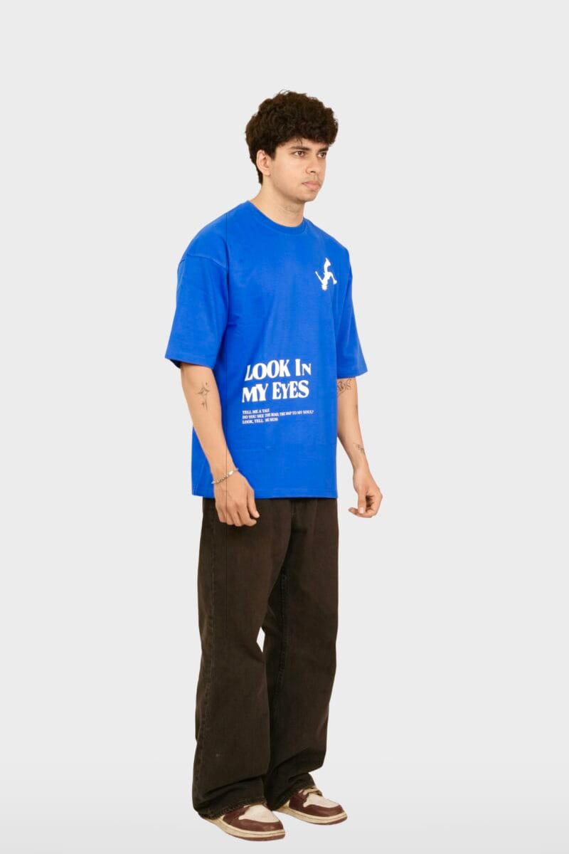 Side profile of the Typographic T-Shirt, showing the oversized fit and blue color.