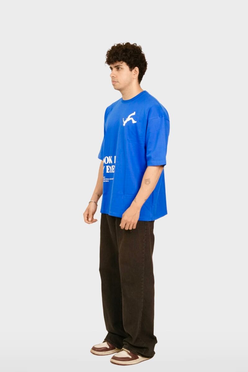 Side profile of the Typographic T-Shirt, showing the oversized fit and blue color.