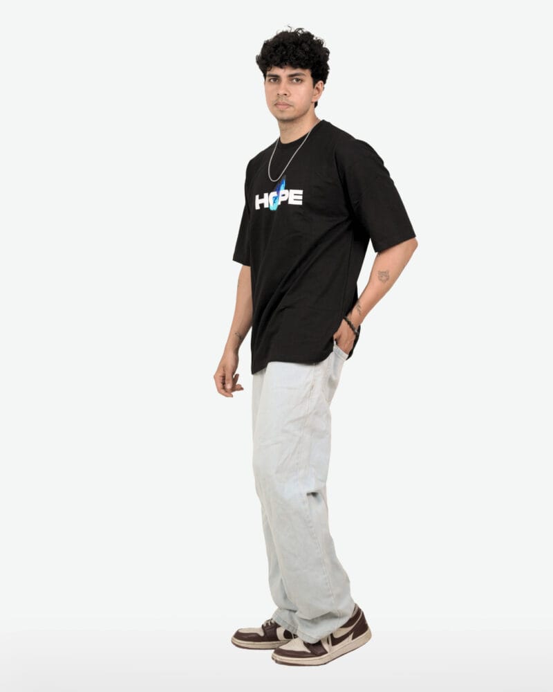 Side profile of the Motivational Graphic T-Shirt, showing the oversized fit.