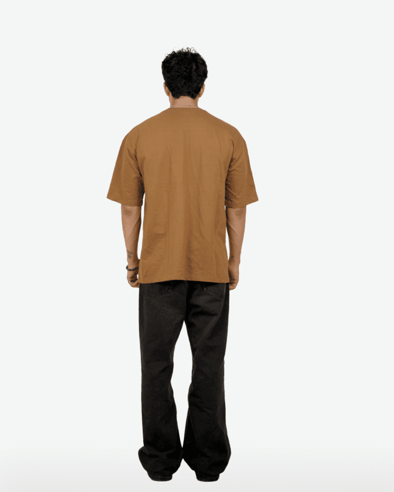 Back view of the oversized Realistic Statue Tee in Mocha Brown, showing the clean back.